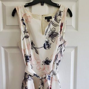 Off white with coloured subtle flowers